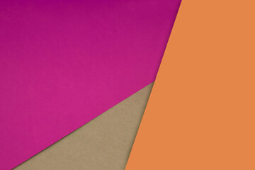 Dark and light, Plain and Textured Shades of pink yellow brown papers background lines intersecting to form a triangle shape