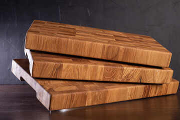 Wooden boards for cutting from pieces of different types of wood