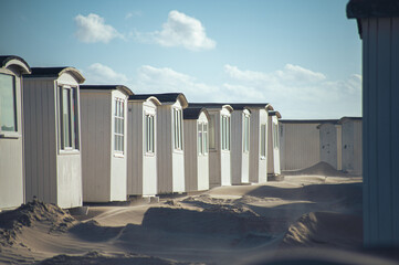 White huts at the beach of Lokken in Denmark. High quality photo