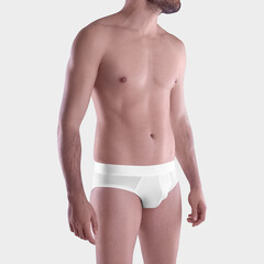 Mockup of white underpants on a posing sports man, male clothing for design, advertising, front,...