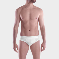 Mockup of white underwear, underpants on the shaved body of a man, close-up, isolated on background, front view.