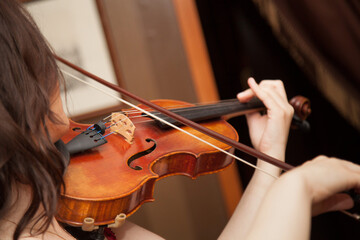 Violin player. Violinist hands playing violin