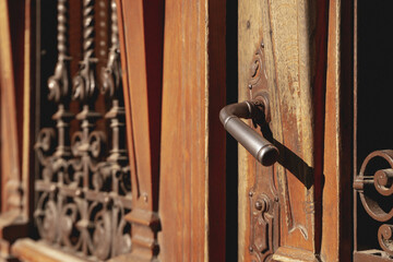 Old wooden doors in Lviv city in sunny day