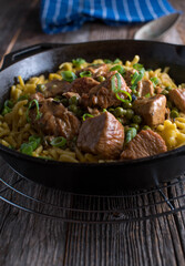 Turkey ragout with green peas and egg noodles