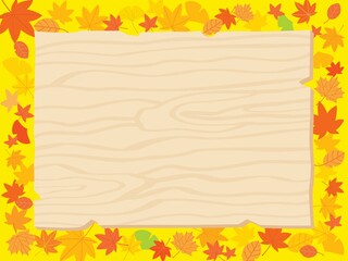 Naklejka na ściany i meble 秋の落ち葉と木のボード