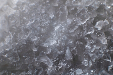 Macro shot of white salt in crystals selective focus. Extremely large view