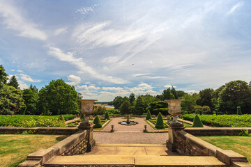 Fototapeta na wymiar Park and parterre garden at historic Tatton Park, English Stately Home in Cheshire, UK.