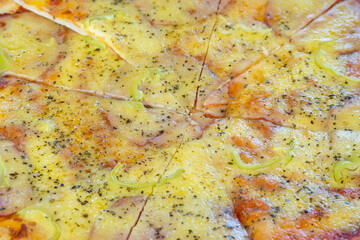 Obraz na płótnie Canvas Pizza background with cheese and vegetables topping