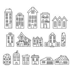 Set of hand drawn houses. Vector illustration in doodle style. Isolated on a white background.