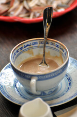 cup of coffee with spoon