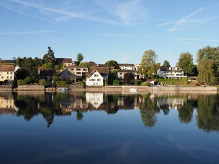 Fototapeta na wymiar Houses at Rhine River in european STEIN AM RHEIN town in SWITZERLAND