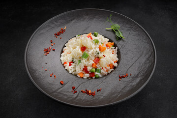 Risotto with vegetables and spices on a plate