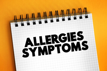 Allergies Symptoms text concept on notepad for presentations and reports