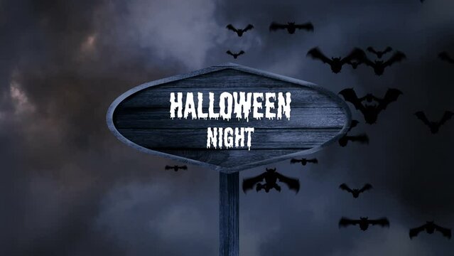 Animation of sign with halloween night text over bats