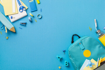 Top view photo of backpack notebooks pencil-case scissors drink bottle plastic alphabet letters...