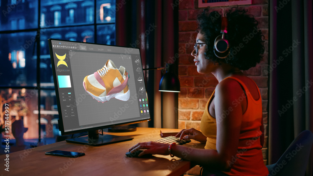 Poster black female art director examining 3d model of shoe while working at desktop computer at home. arti
