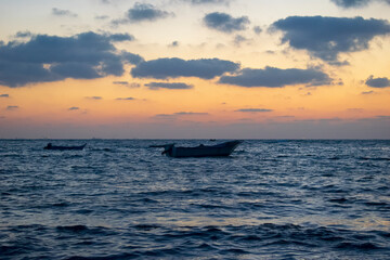 Fototapeta na wymiar boat at sunset