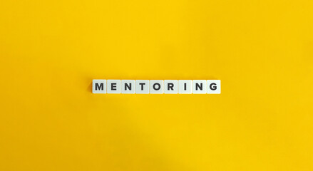 Mentoring Banner. Word on Letter Tiles on Yellow Background. Minimal Aesthetics.