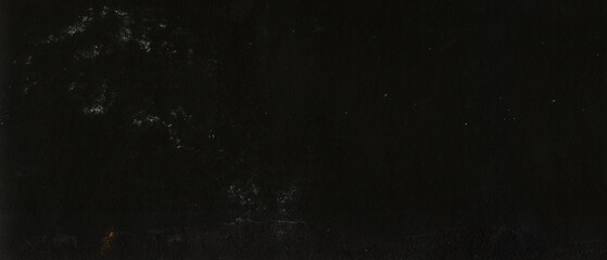 Fondo abstracto en colores muy oscuros, negros con textura de papel. Textura grunge de grano de papel. Espacio para texto o imagen