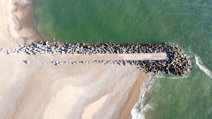 Aerial view of a groyne on a beach, breakwater, coastal protection, climate change, sea level, sea...
