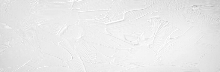 白いエマルジョンで塗られた背景テクスチャー