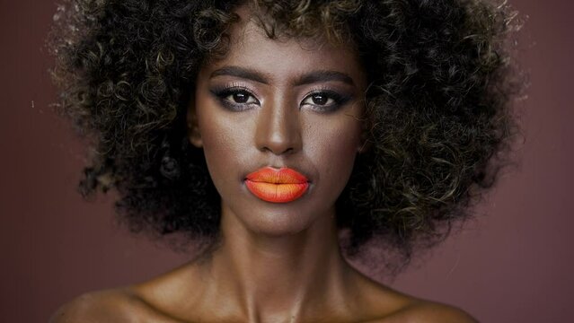 Beautiful portrait of a gorgeous African American fashion model with bare shoulders