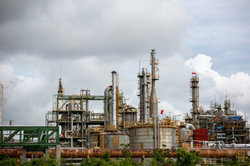Fototapeta na wymiar Scene of oil refinery plant and storage tank oil of Petrochemistry industry