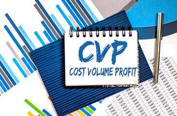 Notebook with text CVP Cost Volume Profit on a chart background