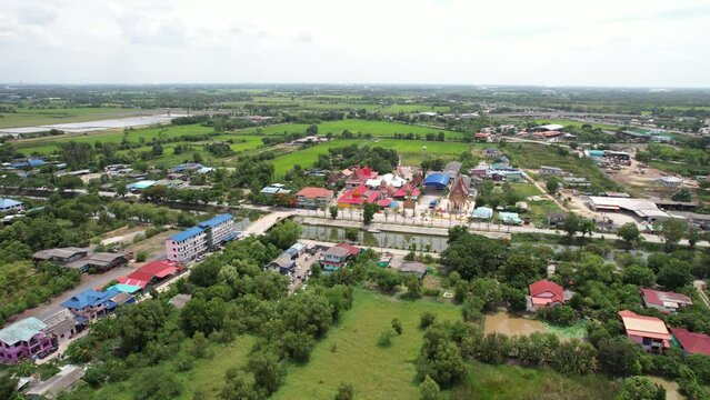 Aerial city view from flying drone at Wat Prem Prachakon ,Chiang Rak Noi, Bang Pa-in District, Phra Nakhon Si Ayutthaya,Thailand
