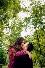 Romantic couple walking and hugging.