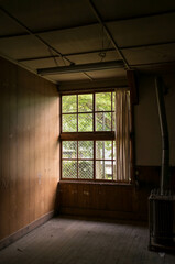 Light and old room shining into a closed school in Japan