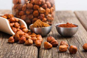 hazelnut cream ingredients on old wooden table