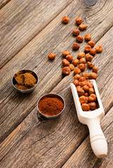 hazelnut cream ingredients on old wooden table