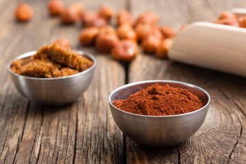 hazelnut cream ingredients on old wooden table