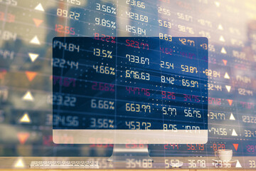 Forex market graph hologram and personal computer on background. Double exposure. Concept of investment.