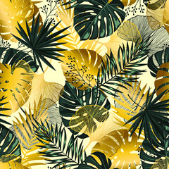 Seamless tropical pattern. Golden and green tropical leaves on a white background. Botanical background.