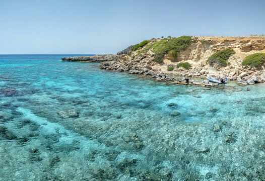 Crystal clear turquoise water in a Fokia closed bay. One of the famous places for great snorkeling. Vacation concept on Greece islands in Aegean and Mediterranean sea. Pefki. East Rhodes. Greece