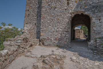 Fototapeta premium Mystras Castle archeological site, built in the 13th century on a mountain summit, overlooking the Lakonia Plain, near the town of Sparta, Peloponnese, Greece
