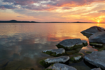 sunset on the lake in summer