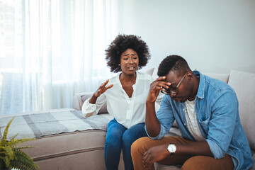 Young couple having argument - conflict, bad relationships. Angry fury woman. Angry young couple...