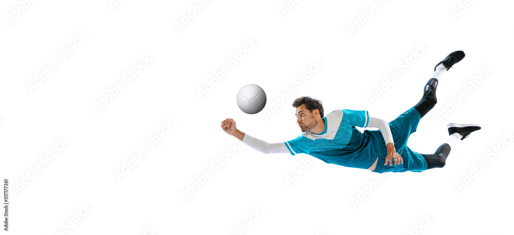 Wall mural Portrait of young man, volleyball player in motion, training, playing isolated over white studio background. Flyer