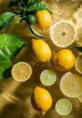Flatlay photo of fresh lemons on table close-up. One lemon surrounded by several lemons...