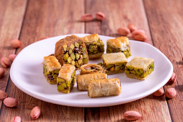 Mix pistachio baklava. Assortment of pistachio baklava on a wooden background. Turkish cuisine desserts. close up