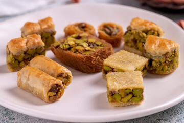 Mix pistachio baklava. Assortment of pistachio baklava on a stone background. Turkish cuisine desserts. close up