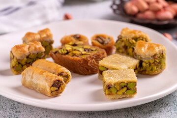 Mix pistachio baklava. Assortment of pistachio baklava on a stone background. Turkish cuisine desserts. close up