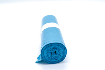 blue color garbage bag roll on white background