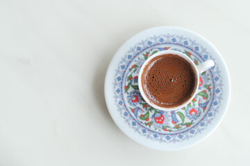 a cup of turkish coffee on white background 