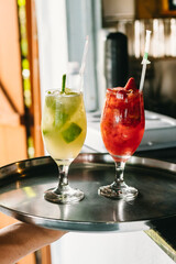 Lemon and strawberry hillbilly leaving the bar and ready to be served in a beach bar in Brazil