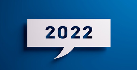 Speech bubble with year number 2022 front of a blue colored wall - 3D illustration