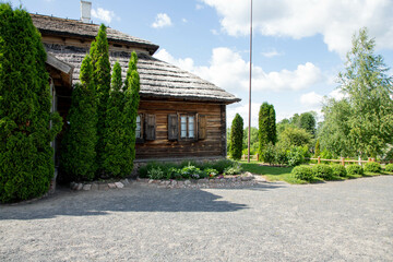 Historic Slavic dwelling on the Molpir hill in the Little Carpathians. Two wooden cottages with straw roof on the hillfort.